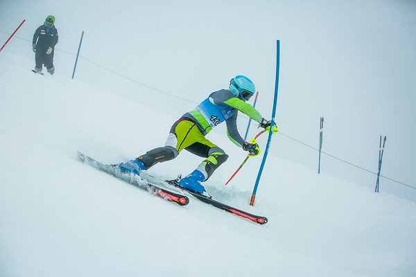 Adam competing during a ski slalom race