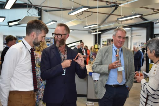 Guests chatting at Art and Design Technology Centre reception