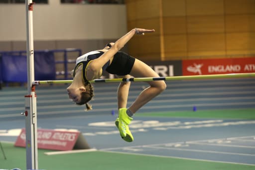 Pocklington School pupil making a high jump at national Competition