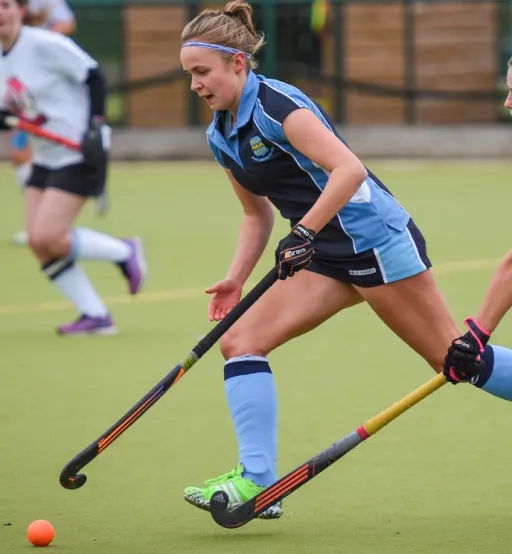 Pocklington School pupil playing in a girls' hockey match on astro