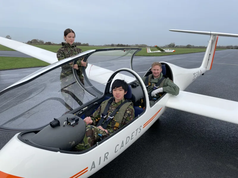 pilot and student sat in glider on runway at RAF Topcliffe