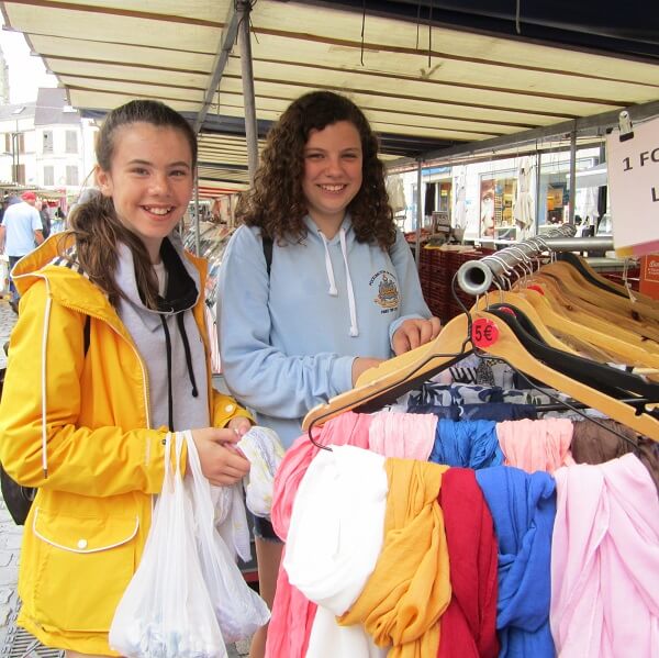 Second year students in a French market during the school trip to Paris