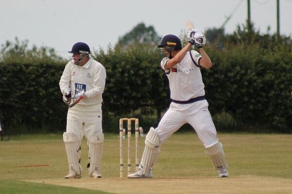 OP Tom Loten strikes the cricket ball during match play for Yorkshire Academy