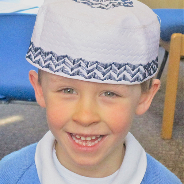 Pocklington Prep School Pupil wearing prayer cap