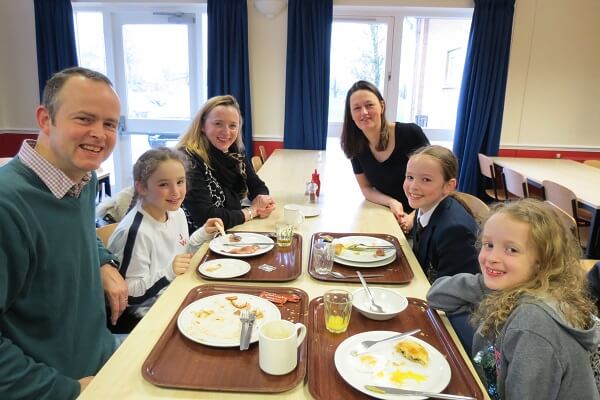 Miss Cheadle, Head of Pocklington School Lower School joins a First Year pupil and her family, to eat breakfast at the FOPS Big Breakfast