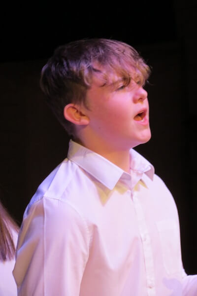 Gruggen Pocklington School pupil performing a solo during the House Music Festival 2019