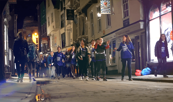 Boarders and staff from Pocklington School's Faircote Boarding House walk through York City Centre as part of their Shine Night Walk