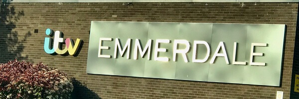 External wall showing the ITV emblem and the words 'Emmerdale' at the television studios in Leeds