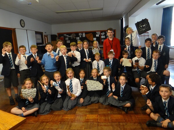 Pocklington Prep pupils and Eco Shed Advisor show examples of recyclable waste