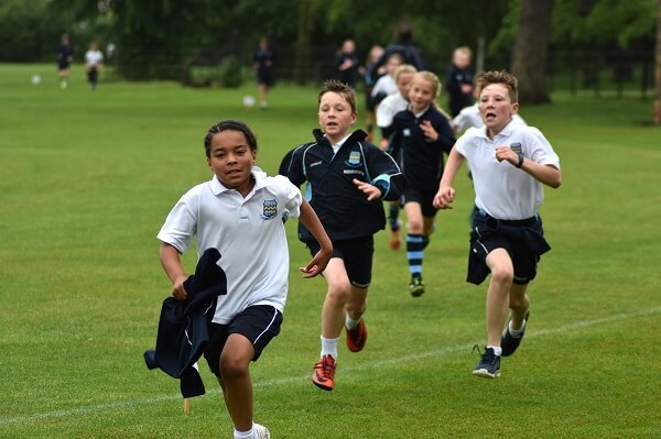 Pocklington Prep pupils running on the school field during the Pock Run