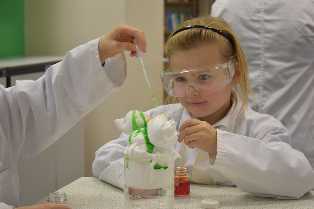 Pocklington Pre-Prep girl doing science experiment