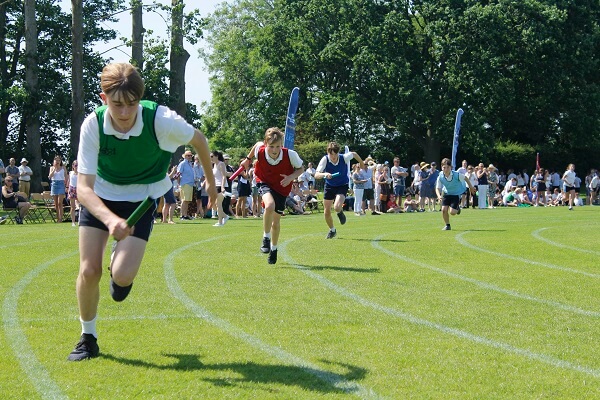 Pupils competing in a track event held at Pocklington School Sports Day