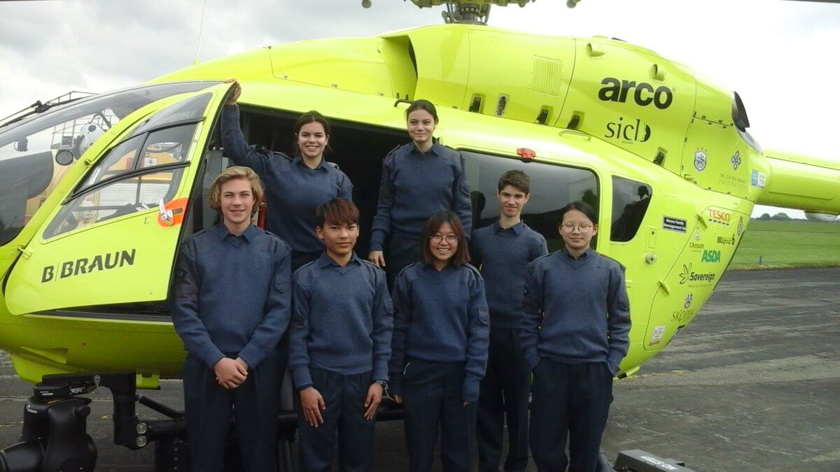 Pocklington School CCF RAF cadets in front of an air ambulance at RAF Topcliffe