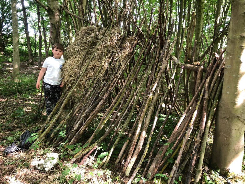 Pocklington Prep School boy building outside den