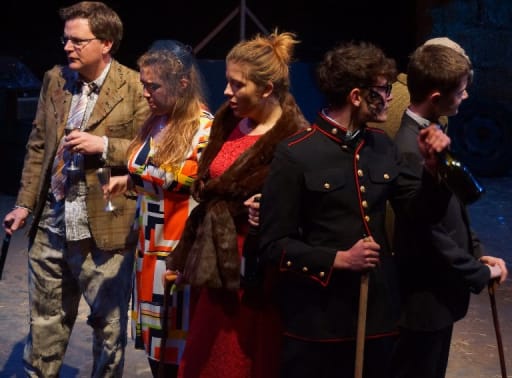 Mark Ronan with fellow cast members  during a scene in Animal Farm