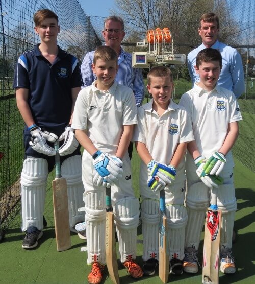 Former parent Mr Jonathan Atkinson with Mr David Byas, Director of Sport and Teacher i/c Cricket, with Pocklington School and Pocklington Prep School pupils