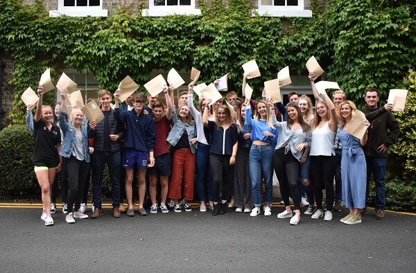 Students at Pocklington School celebrate after receiving their results