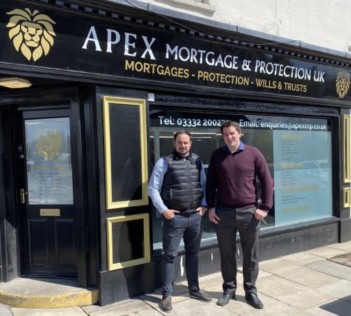 Josh and Lewis Papa stood outside their business premises, Apex Mortgage and Protection UK