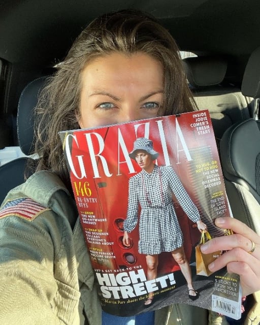 Abi Dee holding copy of Grazia magazine