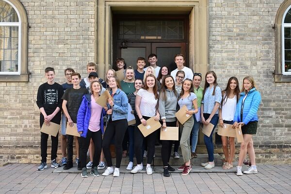 Students at Pocklinton School celebrate after receiving their GCSE results