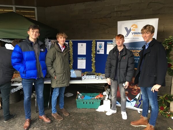 Pocklington School team members at their trade stand at a Young Enterprise event in Harrogate