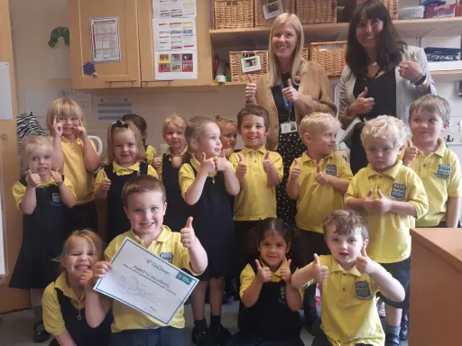 Pre-Prep pupils receive their Go Green Award for Excellence from Pocklington School Eco Champions