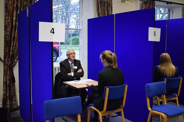 Sixth form students being interviewed as part of a mock mulitple mini interview process