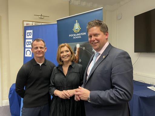 Two guest speakers from the BBE, Chris Attridge and Clare Frisby, stand with Pocklington Headmaster, Toby Seth at the latest 